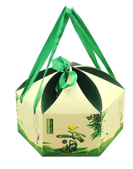 Hexagon-gift-box-with-ribbon-handle-and-embossing